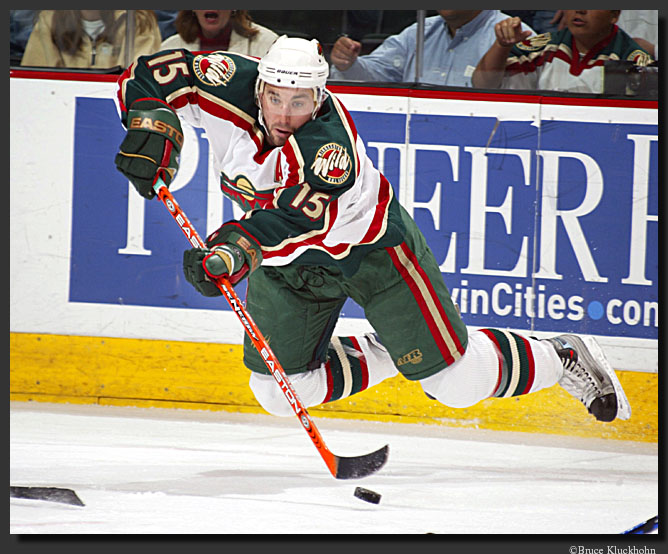 photo of Andrew Brunette making a pass mid-air