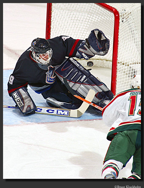 photo of Andrew Brunette scoring a goal against Cloutier in the playoffs.